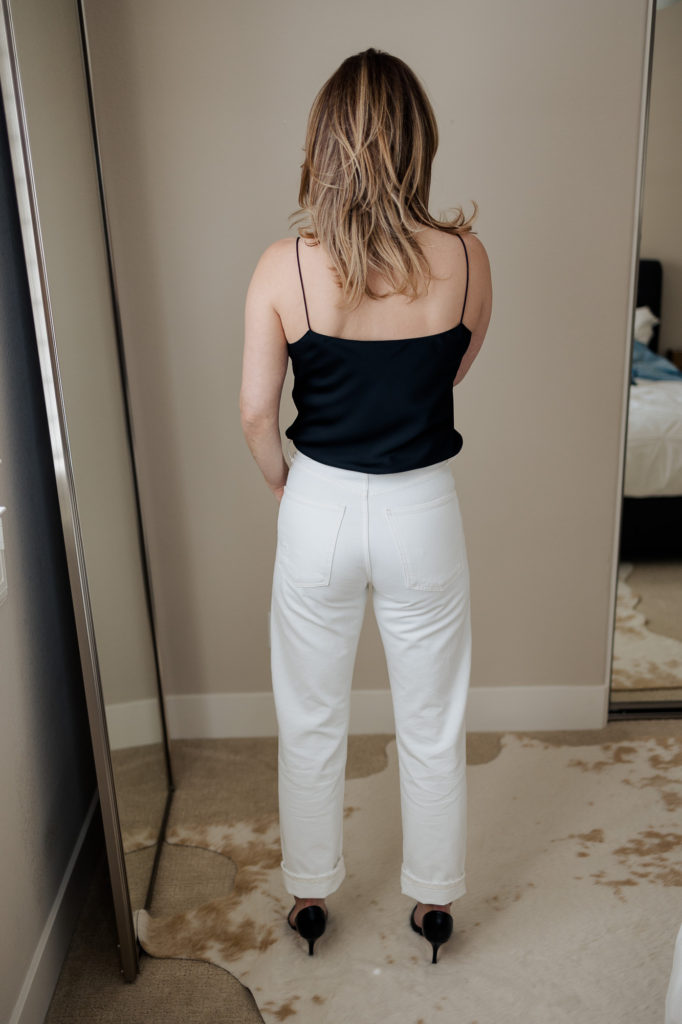 90s jeans for 2021 denim trends in Agolde white Riley with distressing.