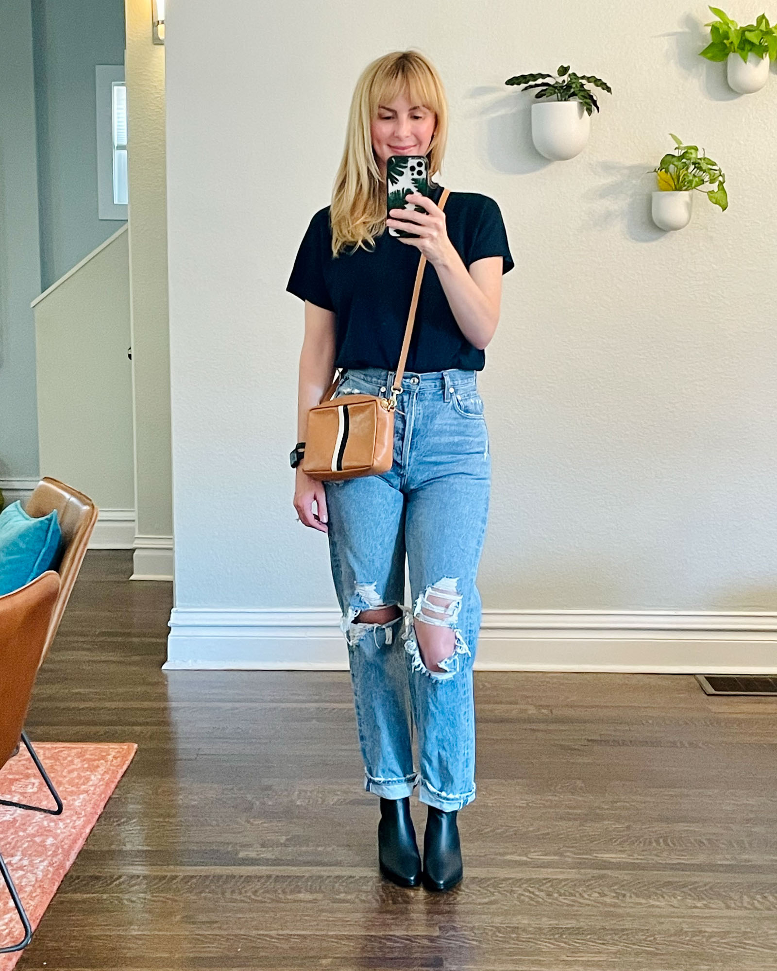Wearing the black Frame chelsea booties from the Nordstrom sale with Agolde 90s jeans.