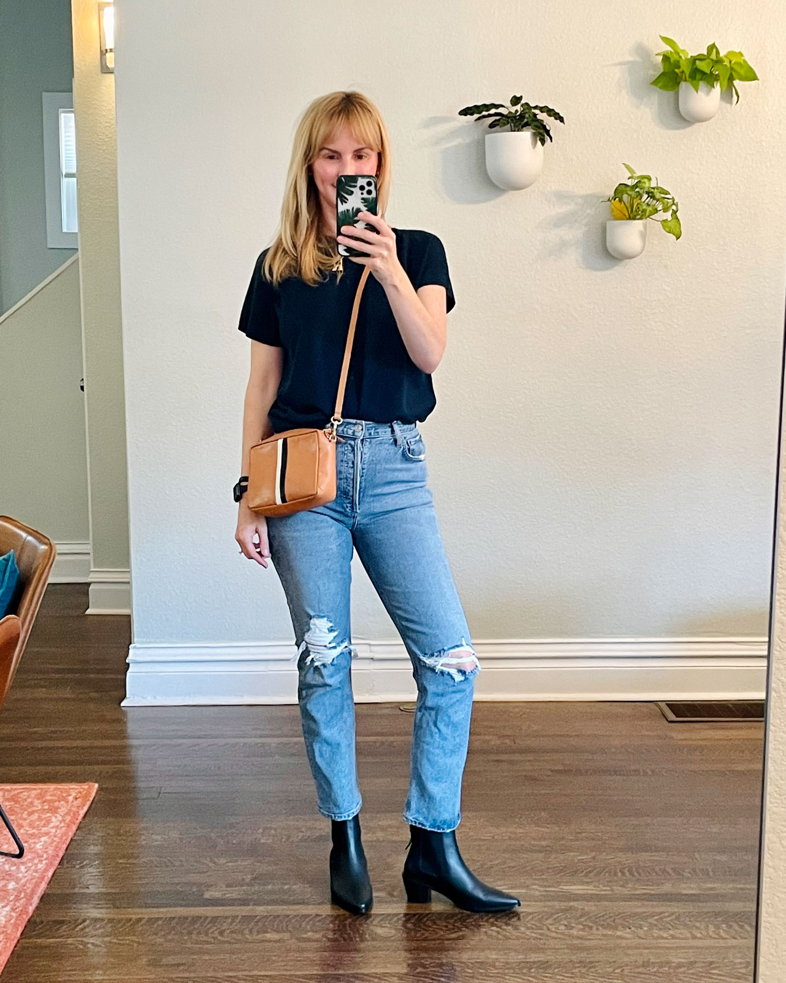 Wearing the black Frame Chelsea booties with my Agolde Riley jeans.