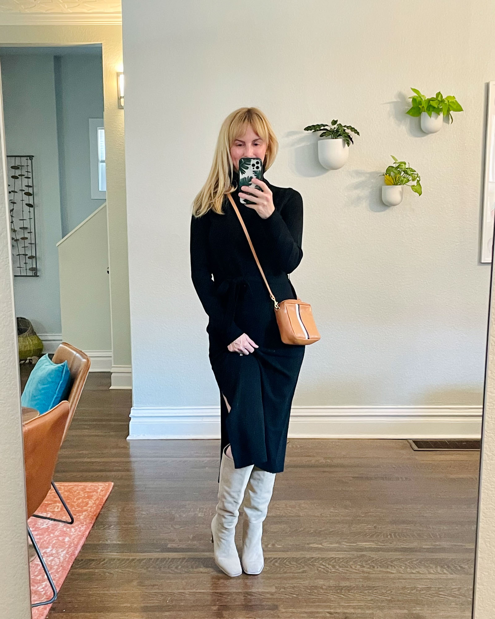 Wearing a black theory cashmere dress with the Sam Edelman Olly knee high boots from the nordstrom anniversary sale.