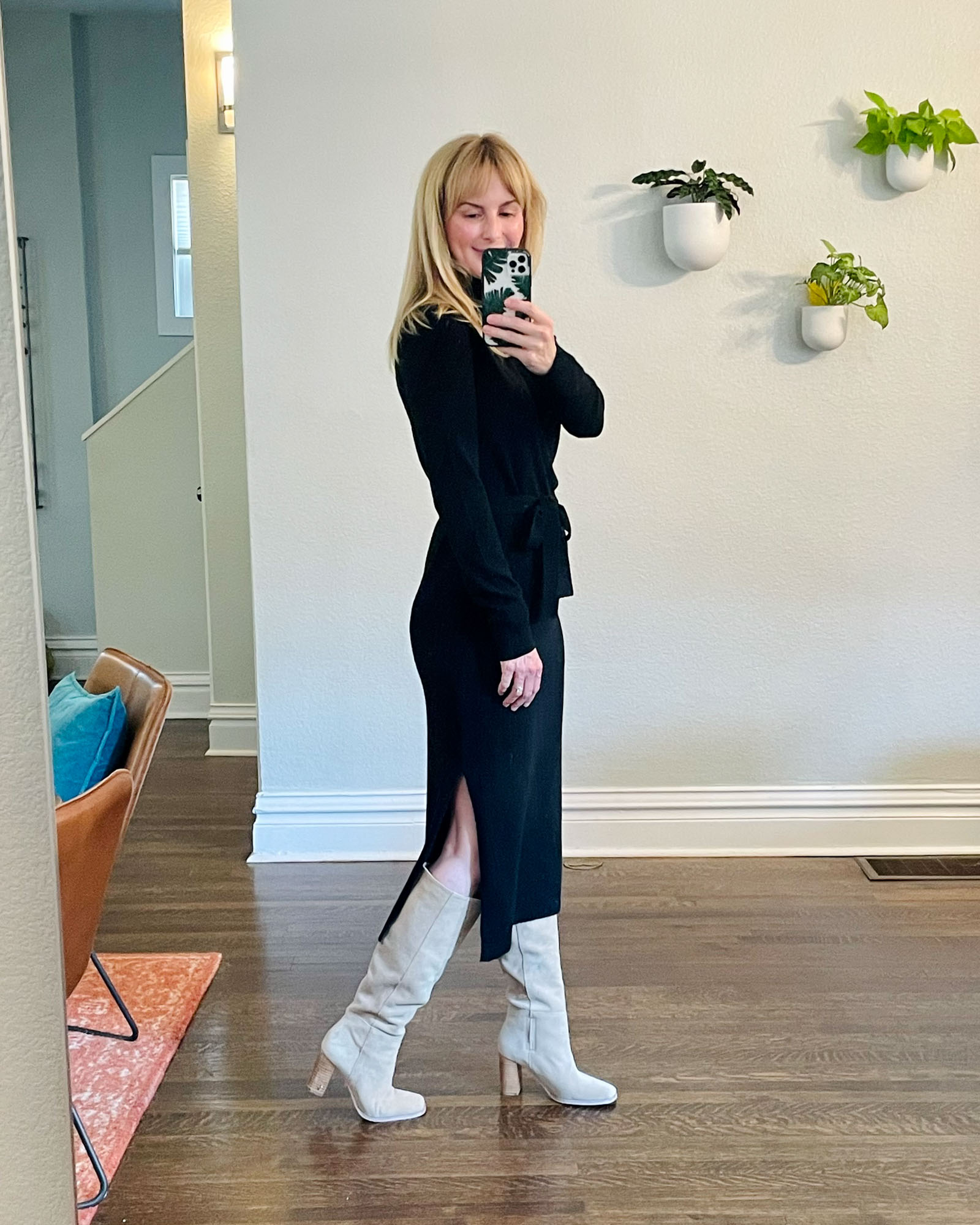 Wearing a black theory cashmere sweater dress with the Sam Edelman Olly knee high boots from the nordstrom anniversary sale.