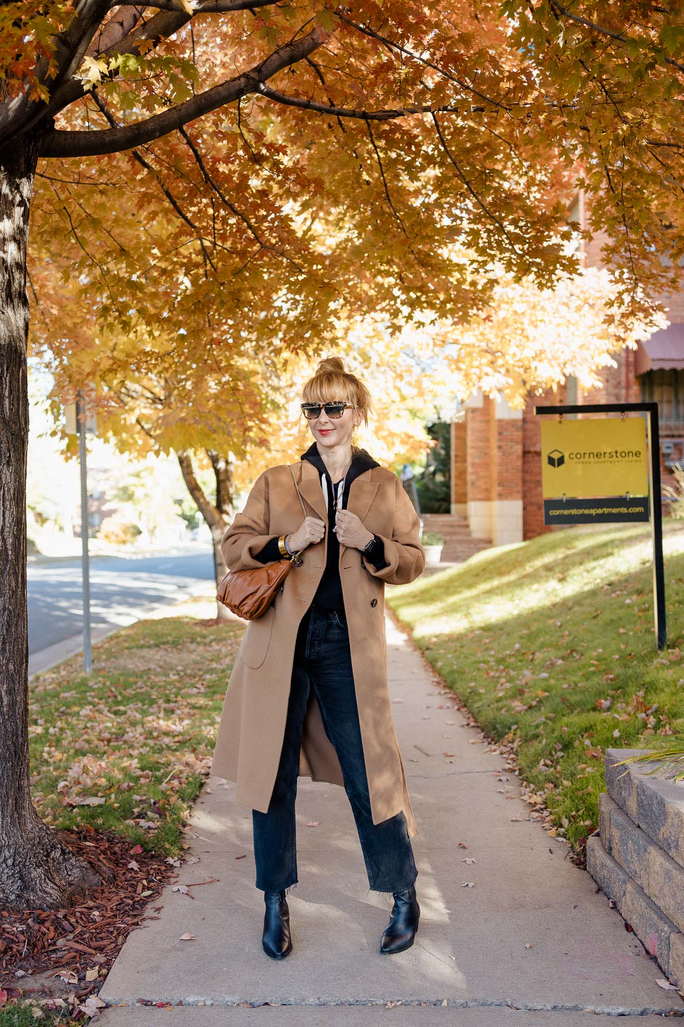 Wearing the Anine Bing Dylan coat in camel over a black rag and bone sweatshirt and black jeans.