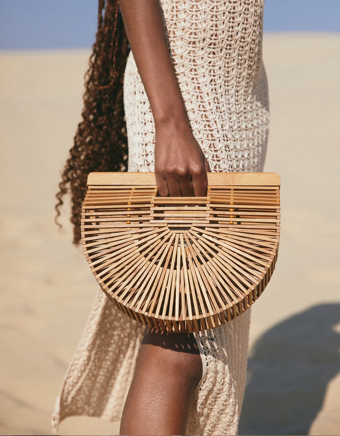 Elisa B. - Clare V does is again with the new Marisol handbag. If you liked  the Mirabel, you'll love the Marisol. It'll hold all your essentials and  then some! Woven in