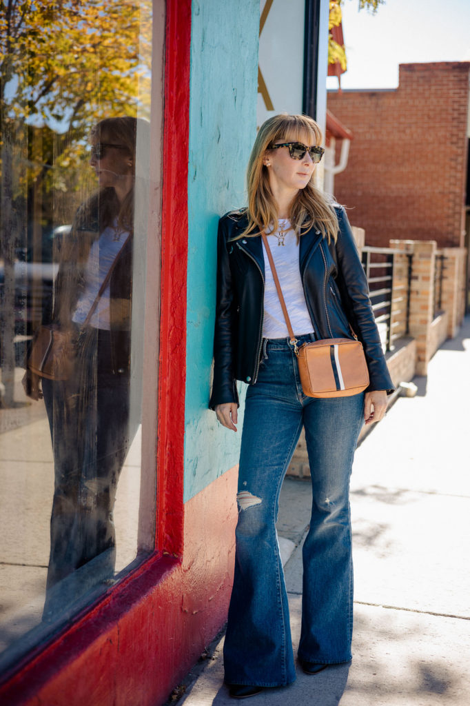 Wearing the Mother Super Cruiser jeans in born to bite with my Iro leather jacket and a white tee and Clare V bag.