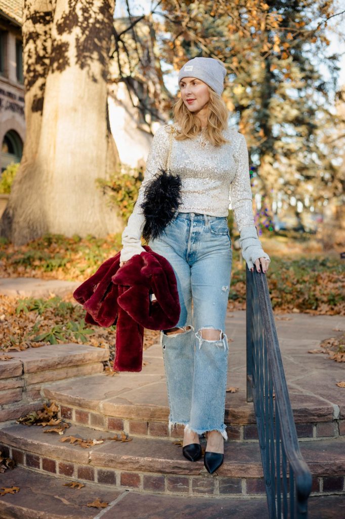 Wearing the Free People sequin top in silver with Moussy Odessa jeans.