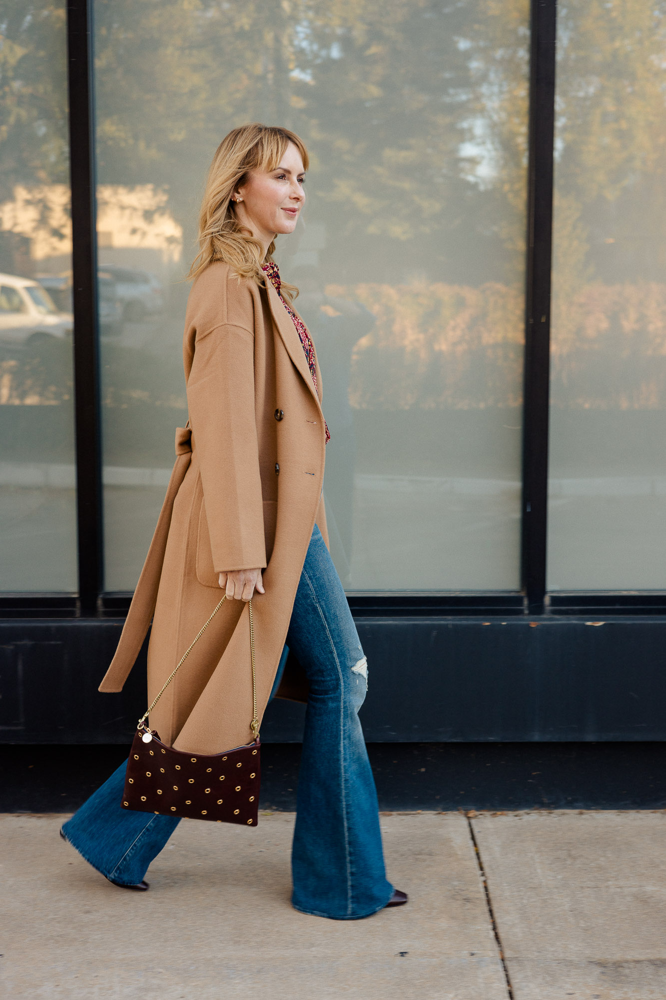 Wearing the Anine Bing Dylan camel coat in camel over Mother flares.