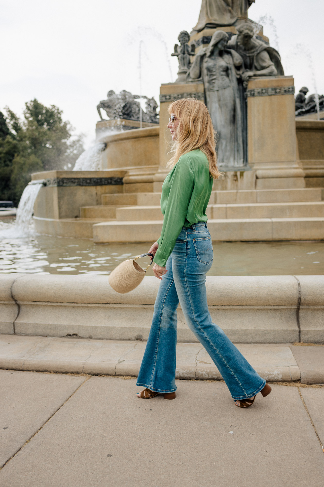 Wearing Lee flares with a green satin Zadig Voltaire blouse and the Clare V. pot de Miel.