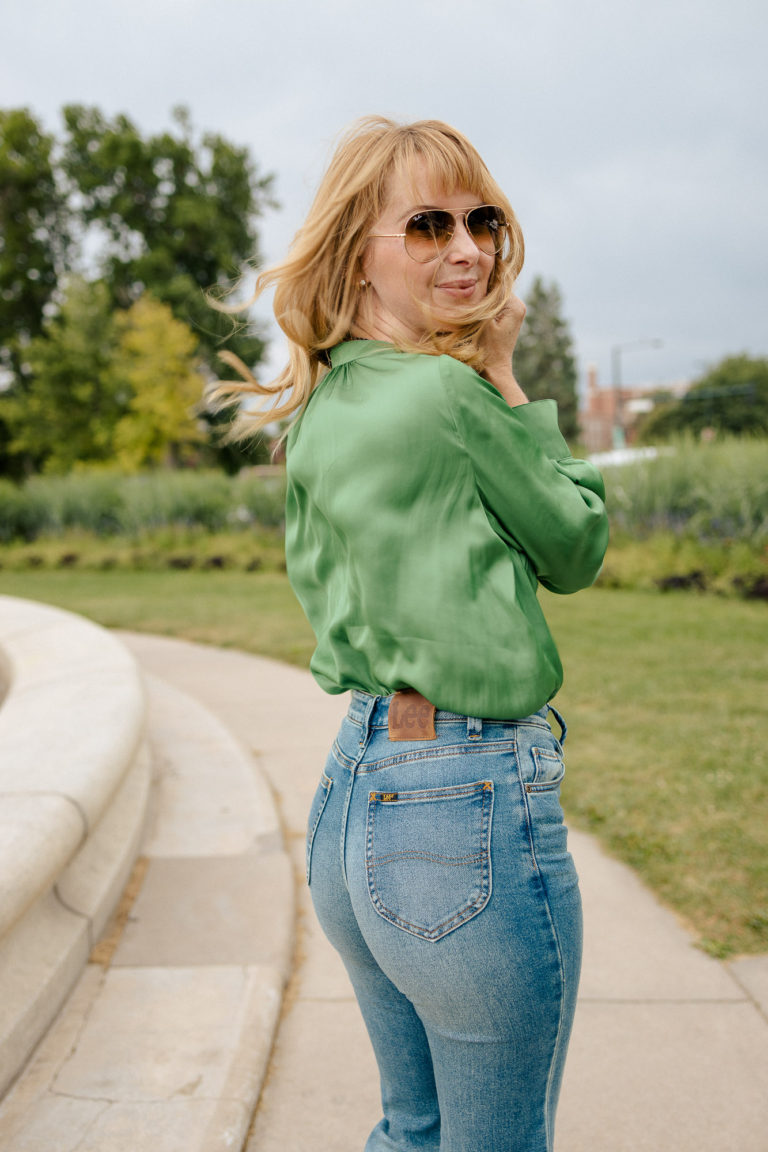 Wearing vintage Lee flare jeans with a green Zadig et Voltaire silk blouse.
