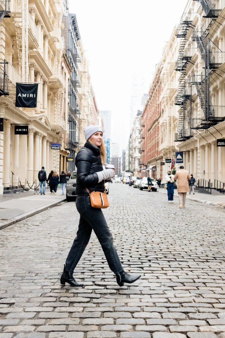 Wearing the black Moncler Lannic Puffer and Clare V midi sac crossbody bag in Soho New York City.