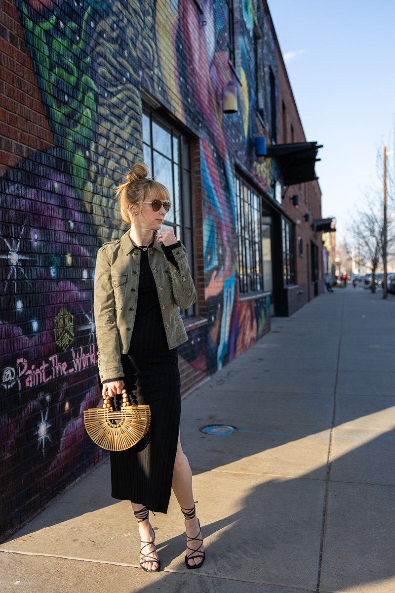 A great date night look is the Paige Pacey jacket in vintage green paired with a black ribbed reformation dress, black Frame Le Doheny sandals and Cult and Gaia ark top handle bag.
