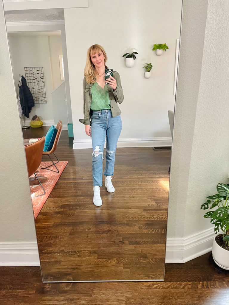 An easy everyday look is this Paige Pacey jacket in green, Agolde Riley jeans in whiplash, Zadig and Voltaire Christy camisole in green and Flash high top sneakers.