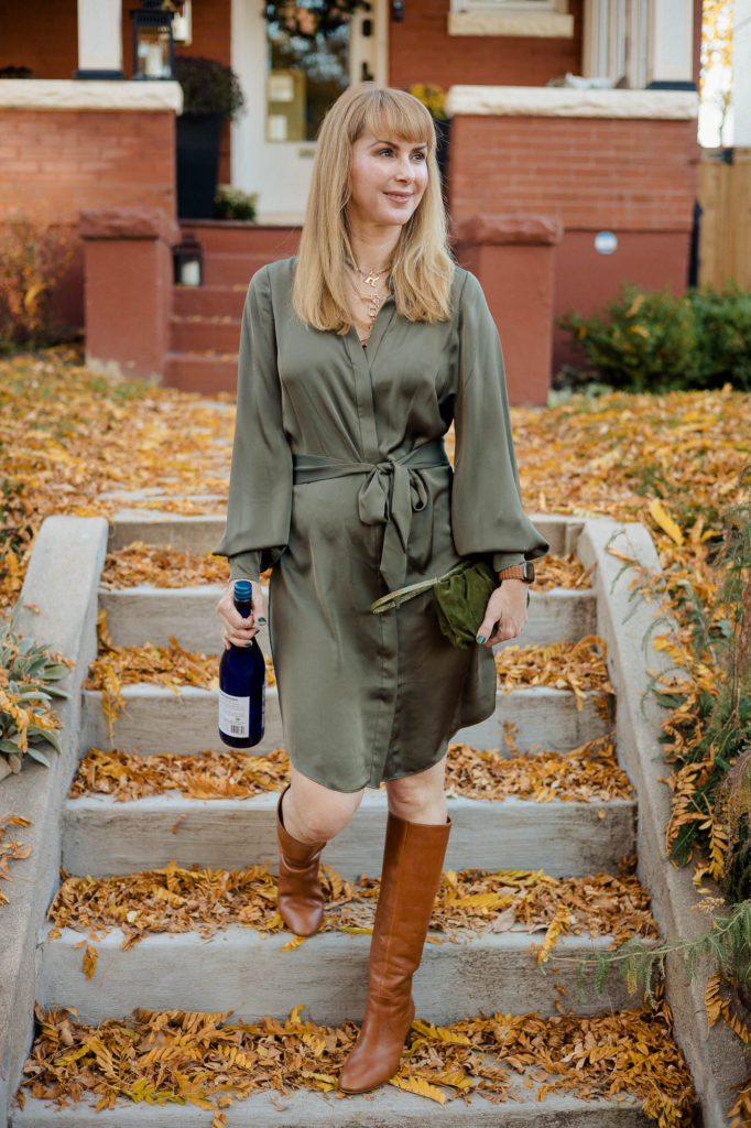 Wearing the Ramy Brook Ayla dress in olive with Loeffler Randall Goldy boots.
