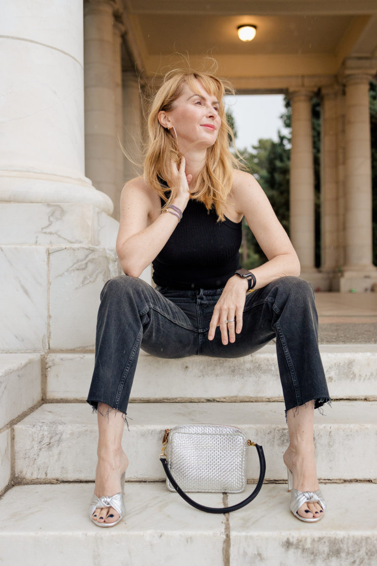 Wearing the black LNA tank with washed black Redone stovepipe jeans and a silver bag and Veronica Beard heels.