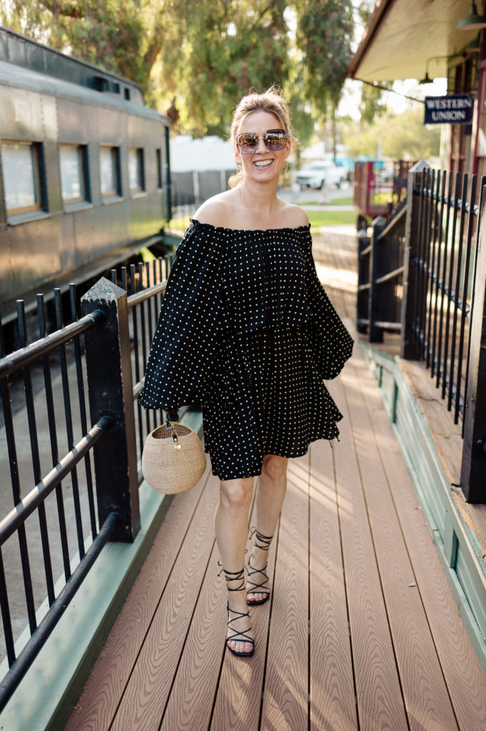 Wearing Rotate Carly dress with Frame Le Doheny sandals and Clare V pot de miel bag with Dior sunglasses and Gorjana hoop earrings.