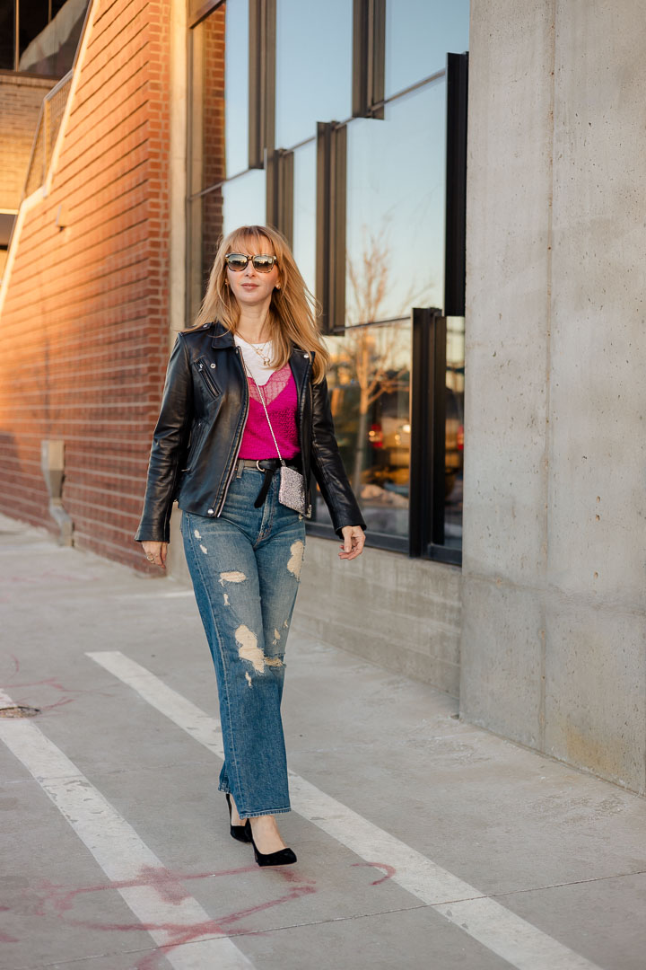 Wearing a hot pink Zadig Voltaire Christy camisole with Mother jeans, black jumps and an Iro black leather jacket.