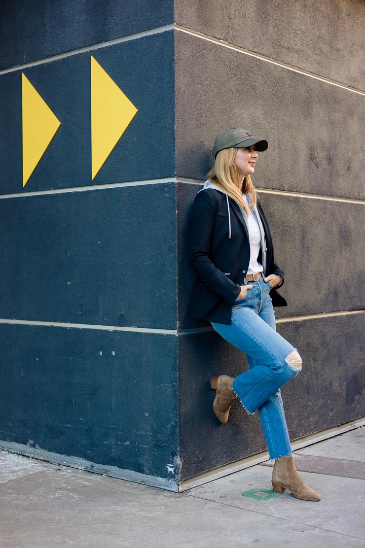 Wearing the Veronica Beard Scuba Blazer in black with mother jeans, Rag & Bone Rover booties and a hat.