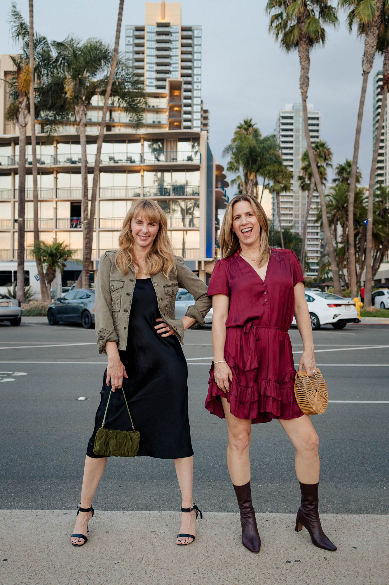 Wearing Fall dresses in downtown San Diego included a black Vince slip dress.